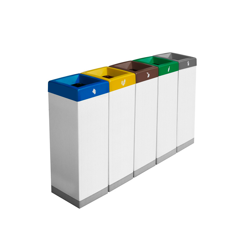 Cinco papeleras de cartón y plástico Denia juntas formando una isla de reciclaje modular para oficinas.